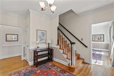 Foyer with hardwood floors.