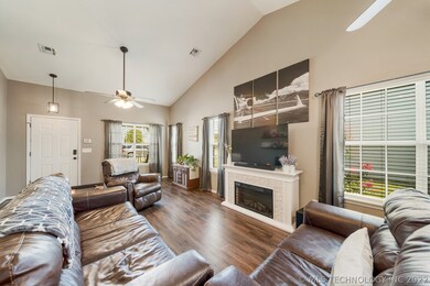 Living has wood-look laminate floors