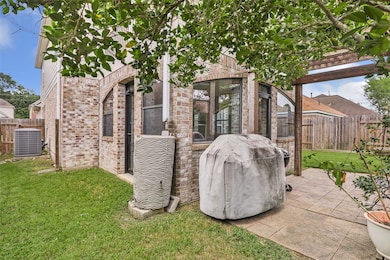 Charming patio with a shaded pergola, perfect for