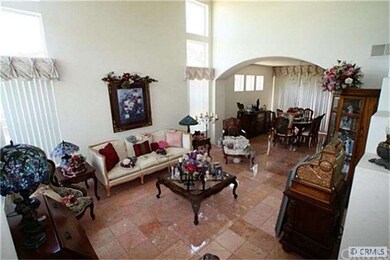 In the entry hall: Living Room and Dining Room bey