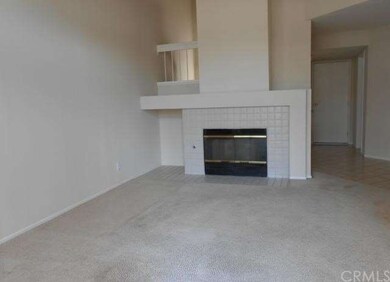 Cozy fireplace in living room.