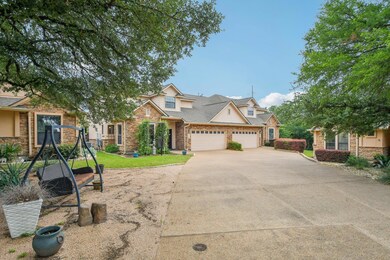 View of front of house with a garage, driveway, s