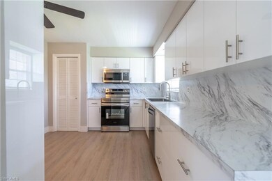 Kitchen featuring stainless steel appliances, sink
