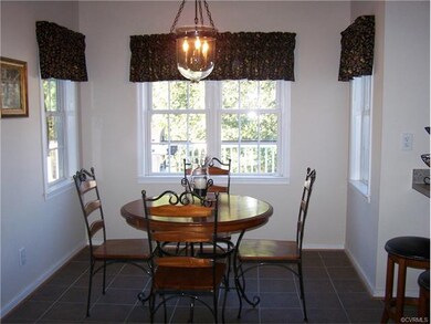 Eat in breakfast nook with tile floor
