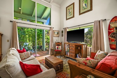 Perfect to BBQ! The living room opens to a spacious covered outdoor lanai.