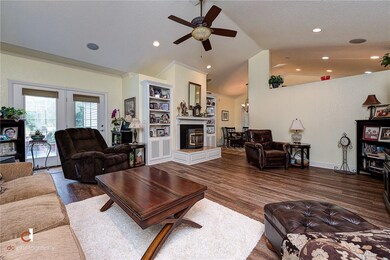 Spacious living room with new floors and cathedral ceiling.  Access to one of the two decks.
