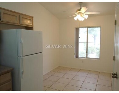 Kitchen. Eat in kitchen nook.  Refrigerator and ce