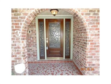 Photo. A gorgeous front entry door is simply elega