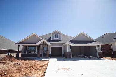 Craftsman inspired home featuring covered porch