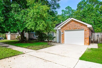 Mature landscaping, garage with automatic door