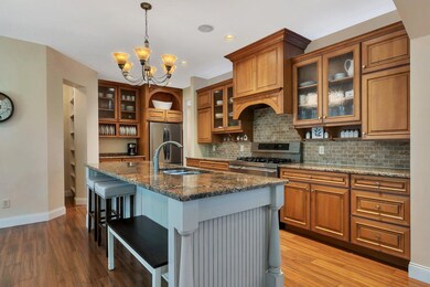 Wow The Detail In The Custom Cabinetry And Center Island Are Superb!!  Enjoy The Separate Coffee Bar And Butler's Pantry!