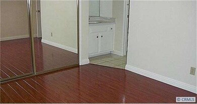 laminated wood floor in all 3 bedrooms