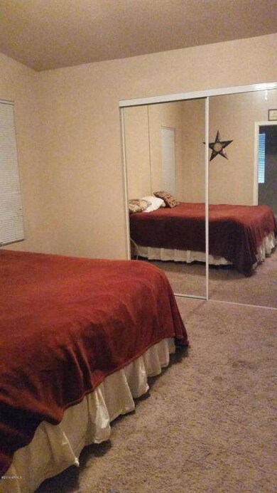Master Bedroom w/ Mirrored Closet Doors