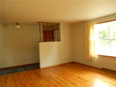 Living Room. Slate Entry is open to Living Room.