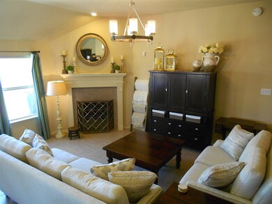 Light and bright living space with views of lovely backyard area.