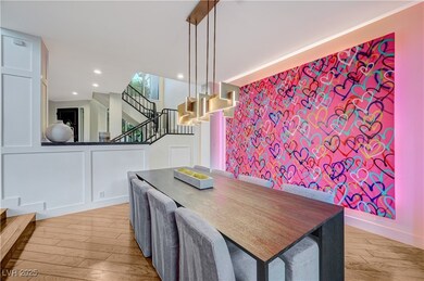 Dining area with stairs, recessed lighting, an acc