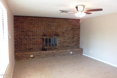 Family room with wood-burning fireplace