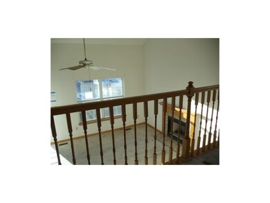 In the dining area looking down to living room