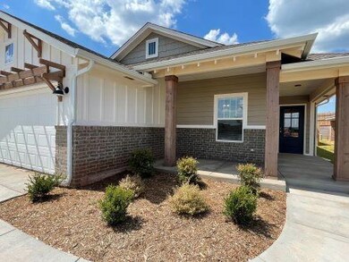 View of front facade featuring a garage