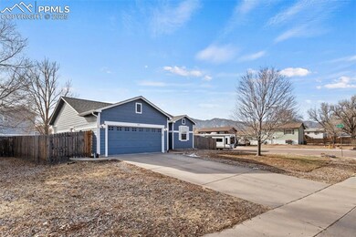 Ranch-style house featuring a garage