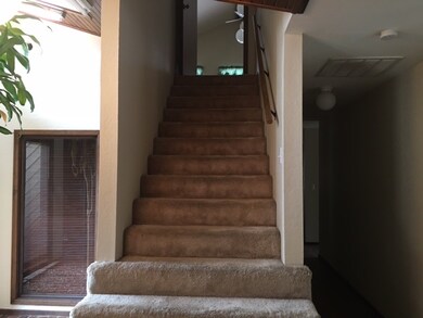 Leads to upstairs extra room