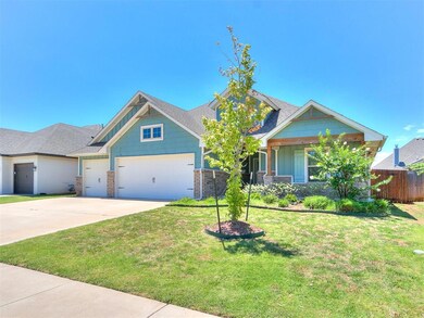 Craftsman-style house featuring a garage and a fro