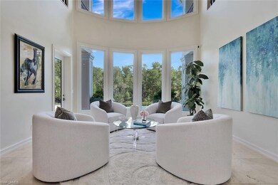 Parlor with 23' Tall Curved Wall of Windows