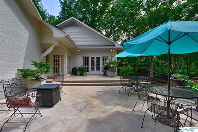 This back terrace is so grand and perfect for large outdoor entertaining
