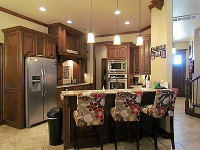 Kitchen. Kitchen has breakfast bar, granite tops, 