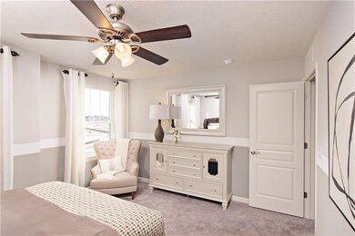 Photo is of a similar home or model.