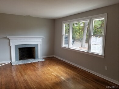 Wood burning fireplace!  Beautiful refinished hardwood floors!  Loads of natural light with the beautiful new window!