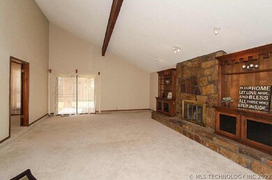 Greatroom with vaulted ceiling.  Beautiful built-i