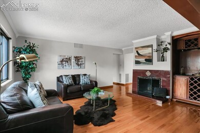 Wood burning fireplace and a wet bar area!