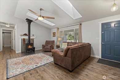 LVP flooring throughout the home. Newer woodstove.