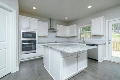 Kitchen featuring appliances with stainless steel 