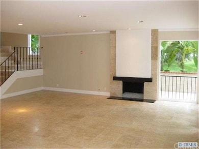 Glorious Travertine Floors throughout the downstai