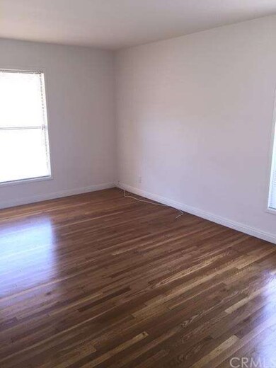 Clean living room with beautiful hardwood floors