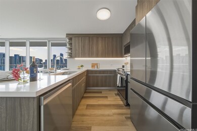 Kitchen features include: Quartz countertops, high-grade vinyl plank flooring, stainless steel appliances, and modern plumbing fixtures.