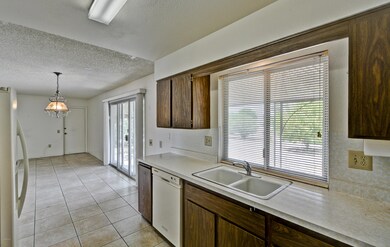 Kitchen looking into Family Room
