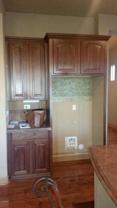 Kitchen Cabinetry next to Refrigerator