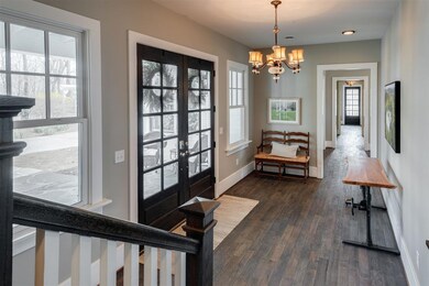 The floors are 4 inch white oak with a unique wire brush finish to mimic the look of antique floors.