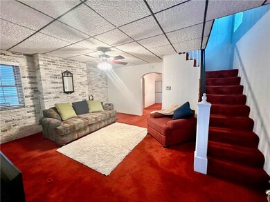 The front door enters into the living room which i
