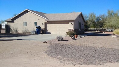 Side yard with attached garage