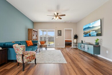 Living room with wood finished floors and ceiling