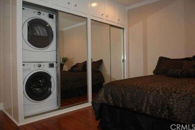 Brand new full size stacked washer and dryer.