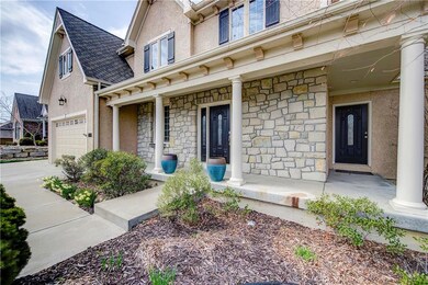 Charming Covered Front Porch and Side Door that le