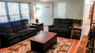 Enjoy your favorite TV show, or after work wind-down in this sunny living room.