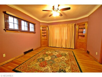 Formal Dining Room has hardwood floors, crown mold