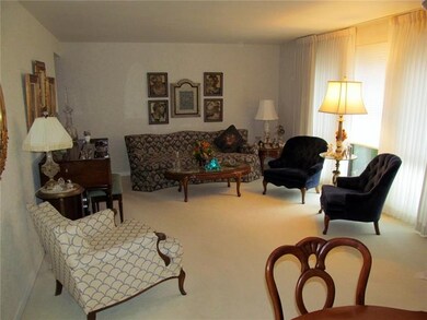 Custom draperies will remain with the home.