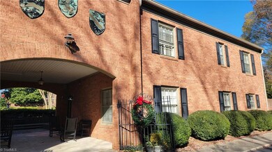 Entrance through breezeway on right.  Ahead is private courtyard. Parking available on this entry across from unit.